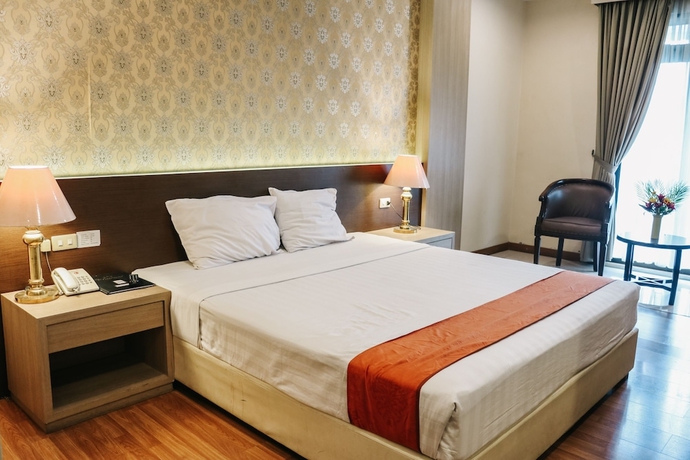 Imagen de la habitación del Hotel The Amrani Syariah. Foto 8