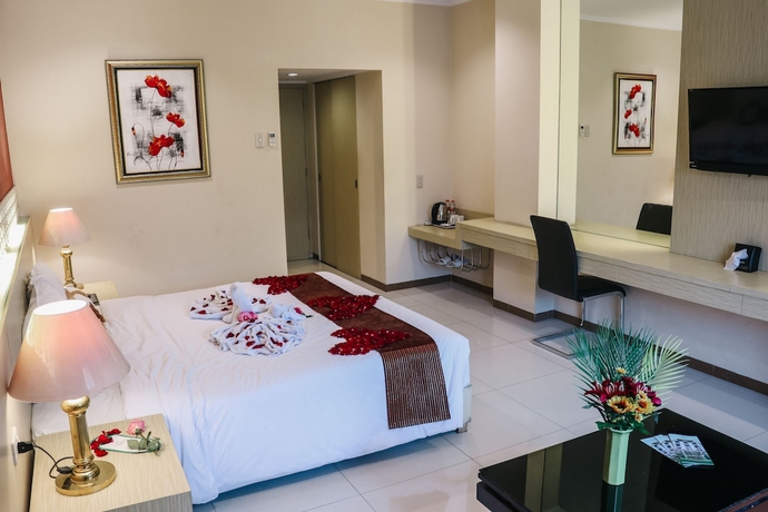 Imagen de la habitación del Hotel The Amrani Syariah. Foto 9