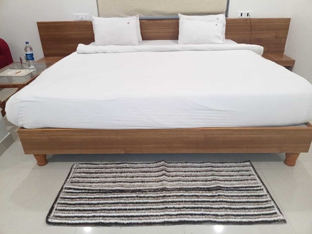 Imagen de la habitación del Hotel The Amrit. Foto 3