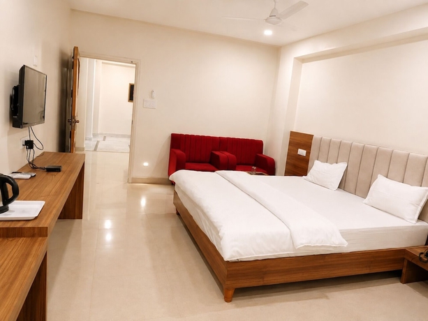 Imagen de la habitación del Hotel The Amrit. Foto 9