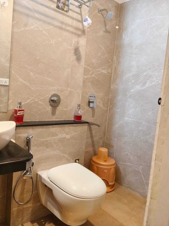 Imagen de la habitación del Hotel The Amrit. Foto 12