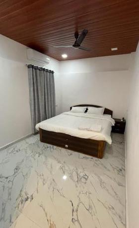 Imagen de la habitación del Hotel The Ancestral Home Nala Sopara. Foto 15