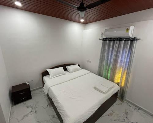 Imagen de la habitación del Hotel The Ancestral Home Nala Sopara. Foto 16