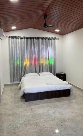 Imagen de la habitación del Hotel The Ancestral Home Nala Sopara. Foto 17