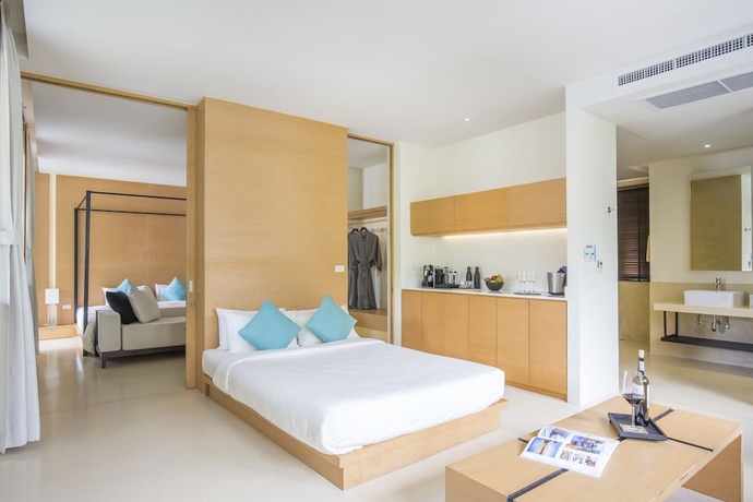 Imagen de la habitación del Hotel The Anda Mani Khaolak Beachfront Villas. Foto 4