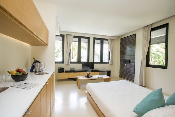 Imagen de la habitación del Hotel The Anda Mani Khaolak Beachfront Villas. Foto 5