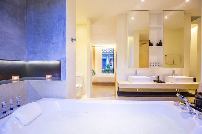 Imagen de la habitación del Hotel The Anda Mani Khaolak Beachfront Villas. Foto 6