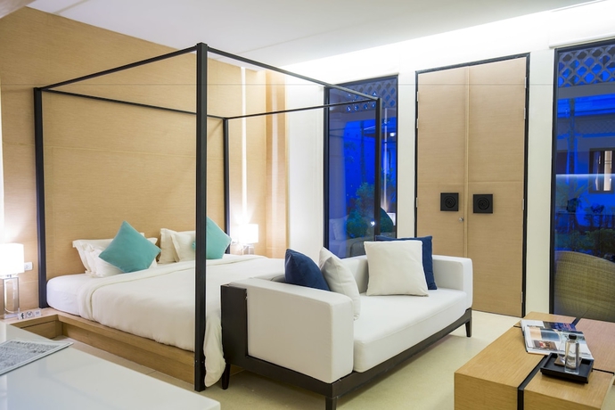 Imagen de la habitación del Hotel The Anda Mani Khaolak Beachfront Villas. Foto 7