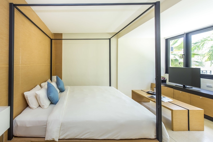 Imagen de la habitación del Hotel The Anda Mani Khaolak Beachfront Villas. Foto 11
