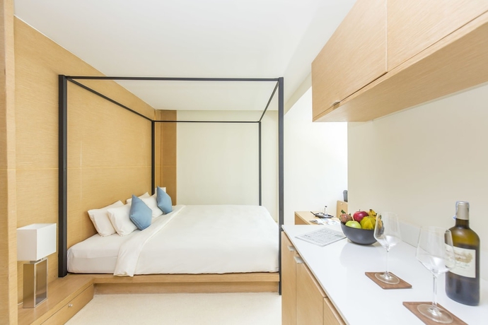 Imagen de la habitación del Hotel The Anda Mani Khaolak Beachfront Villas. Foto 13