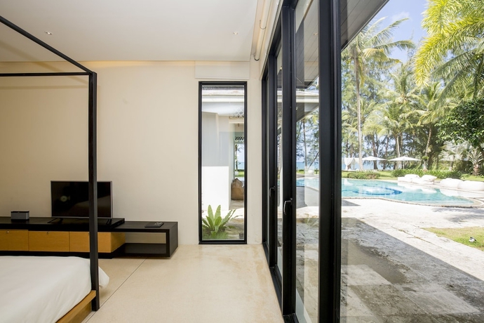 Imagen de la habitación del Hotel The Anda Mani Khaolak Beachfront Villas. Foto 16
