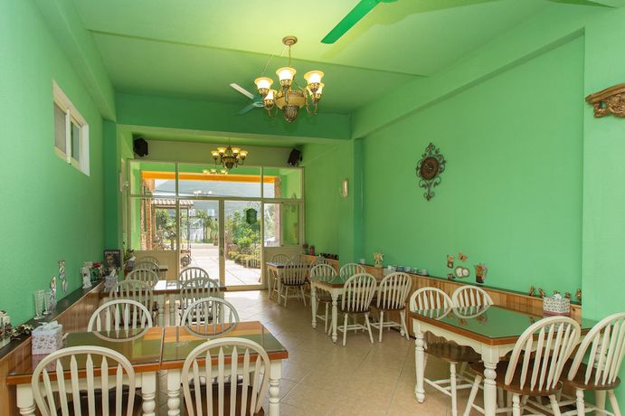 Imagen del bar/restaurante del Hotel The Anderson Manor. Foto 2