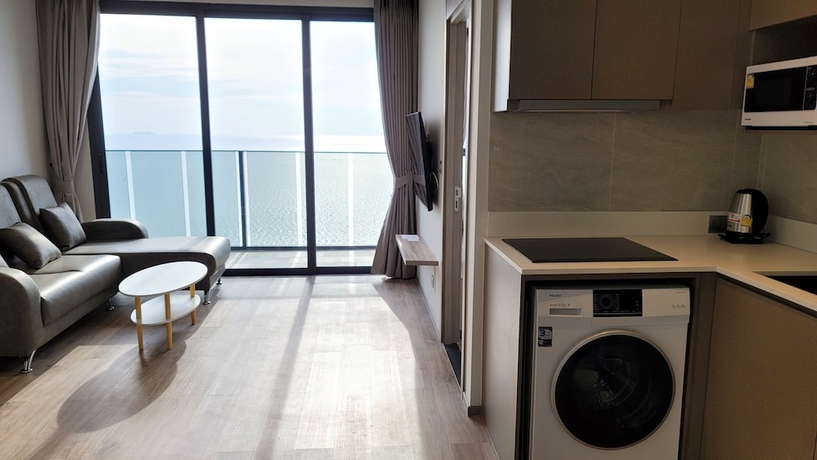 Imagen de la habitación del Hotel The Andromeda Condominium. Foto 4