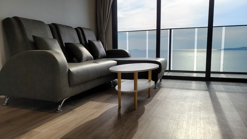 Imagen de la habitación del Hotel The Andromeda Condominium. Foto 7