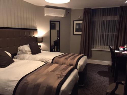 Imagen de la habitación del Hotel The Angel Wetherspoon. Foto 6