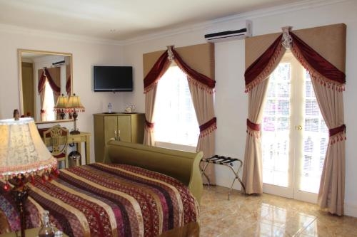 Imagen de la habitación del Hotel The Angels Place Boutique. Foto 6