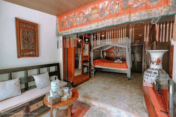 Imagen de la habitación del Hotel The Antique Riverside. Foto 28