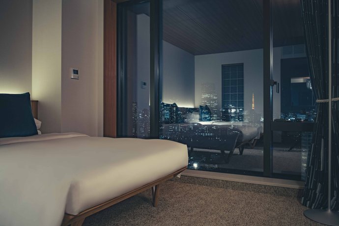 Imagen de la habitación del Hotel The Aoyama Grand. Foto 10