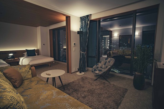 Imagen de la habitación del Hotel The Aoyama Grand. Foto 17