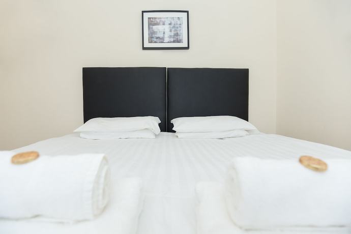 Imagen de la habitación del Hotel The Apartment Company. Foto 9