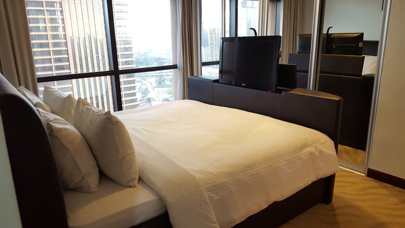 Imagen de la habitación del Hotel The Apartments At Times Square. Foto 11