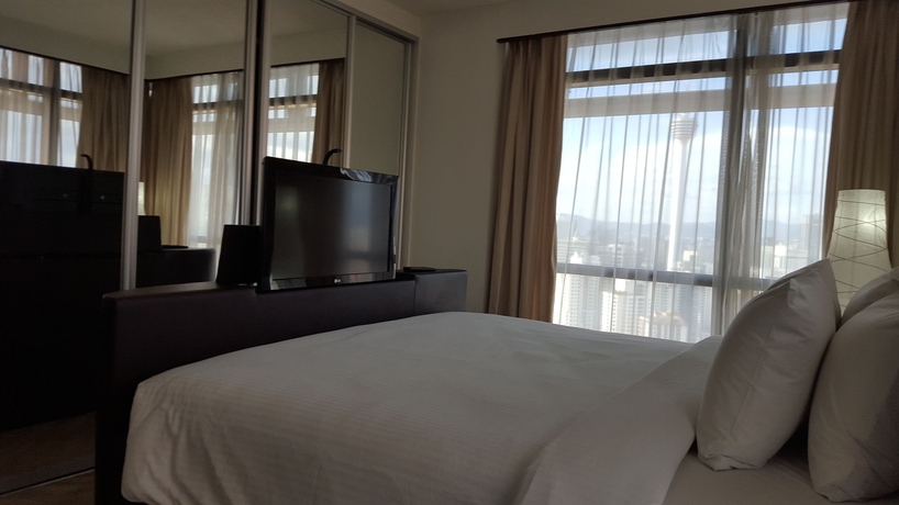 Imagen de la habitación del Hotel The Apartments At Times Square. Foto 12