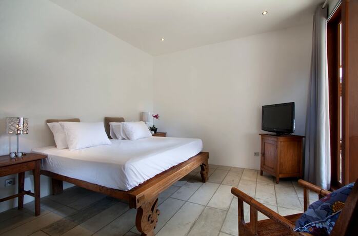 Imagen de la habitación del Hotel The Apartments Canggu. Foto 12