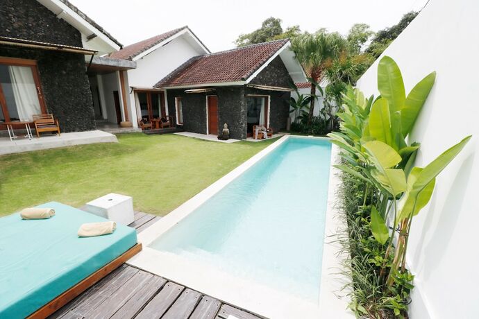 Imagen de la habitación del Hotel The Apartments Canggu. Foto 16