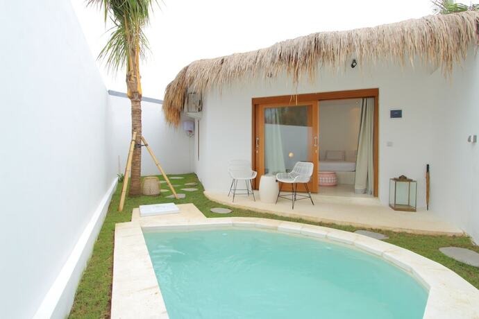 Imagen de la habitación del Hotel The Apartments Canggu. Foto 17