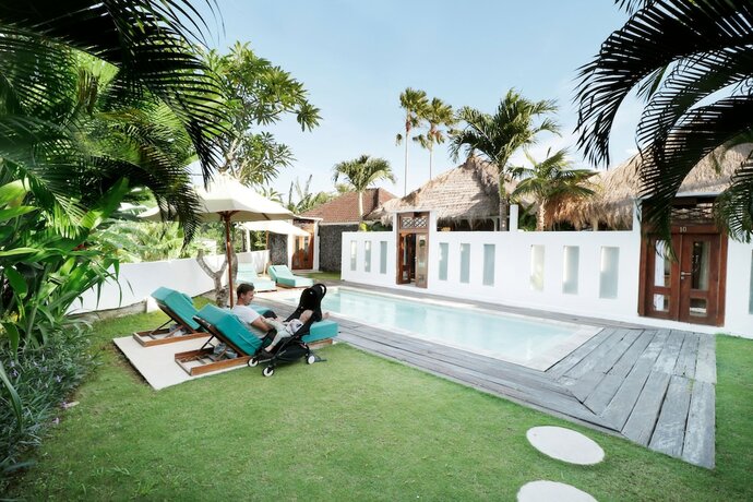 Imagen de la habitación del Hotel The Apartments Canggu. Foto 19