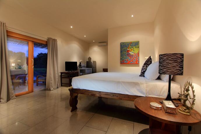 Imagen de la habitación del Hotel The Apartments Canggu. Foto 22