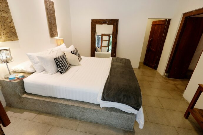 Imagen de la habitación del Hotel The Apartments Canggu. Foto 23