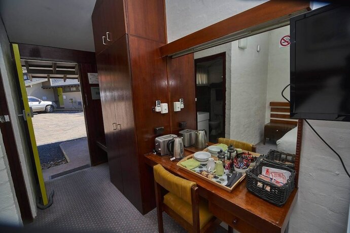 Imagen del bar/restaurante del Hotel The Apple Inn. Foto 15