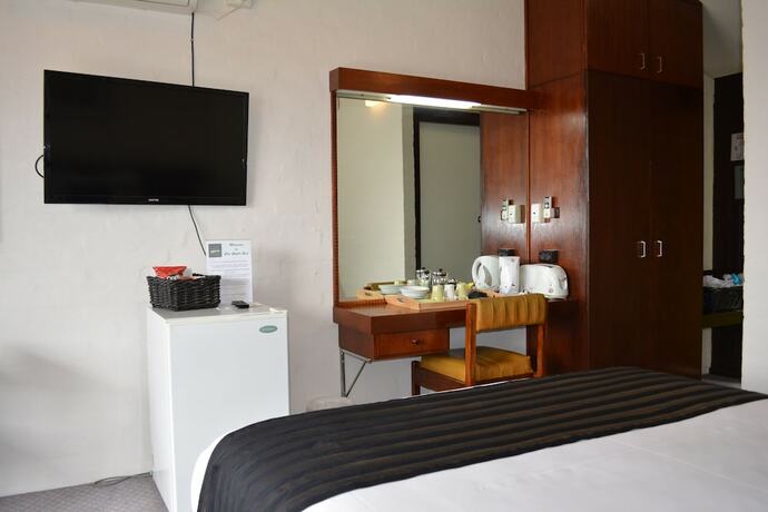 Imagen de la habitación del Hotel The Apple Inn. Foto 35