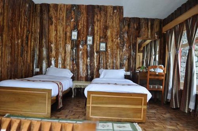 Imagen de la habitación del Hotel The Apple Orchard Retreat. Foto 18