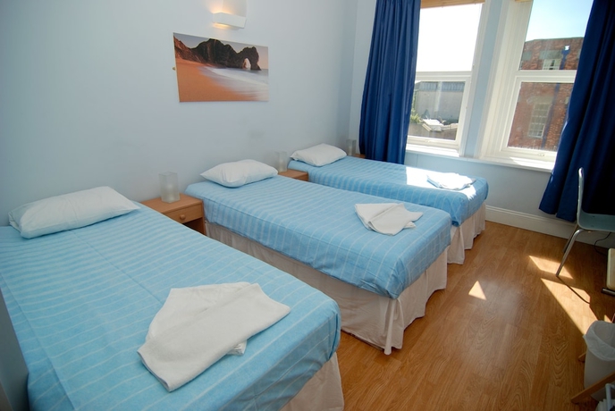 Imagen de la habitación del Hotel The Aqua. Foto 8
