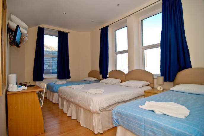 Imagen de la habitación del Hotel The Aqua. Foto 10