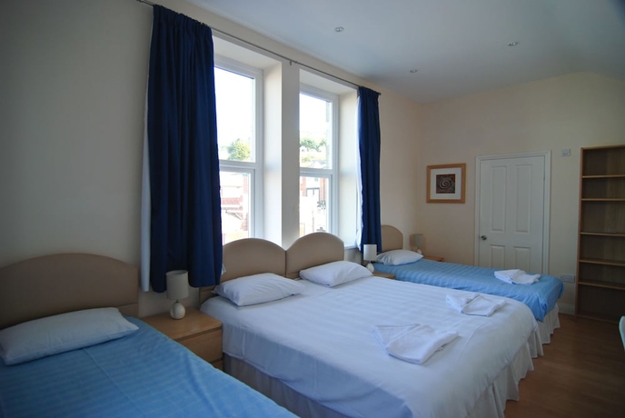 Imagen de la habitación del Hotel The Aqua. Foto 11