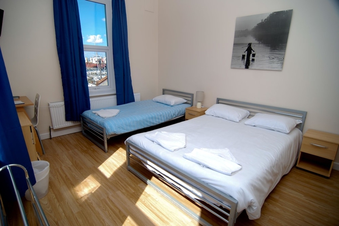 Imagen de la habitación del Hotel The Aqua. Foto 14