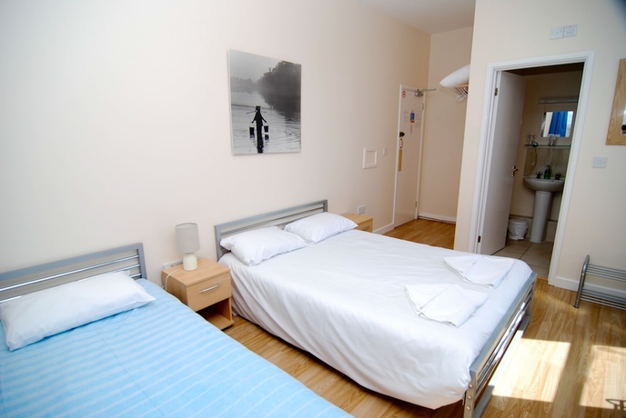 Imagen de la habitación del Hotel The Aqua. Foto 16