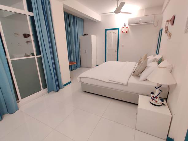 Imagen de la habitación del Hotel The Aquzz. Foto 2
