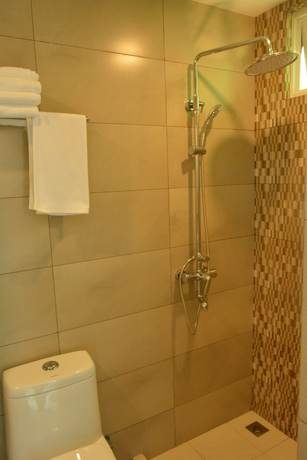Imagen de la habitación del Hotel The Aquzz. Foto 3
