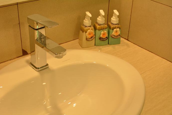 Imagen de la habitación del Hotel The Aquzz. Foto 7