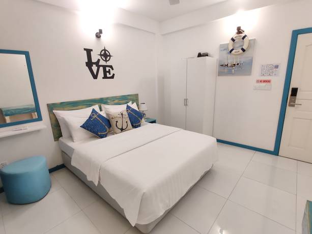 Imagen de la habitación del Hotel The Aquzz. Foto 9