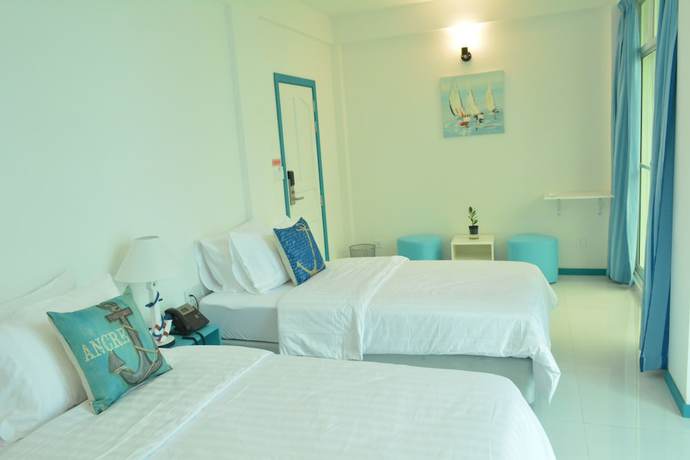 Imagen de la habitación del Hotel The Aquzz. Foto 11
