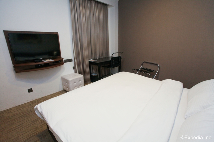 Imagen de la habitación del Hotel The Arena Country Club. Foto 8
