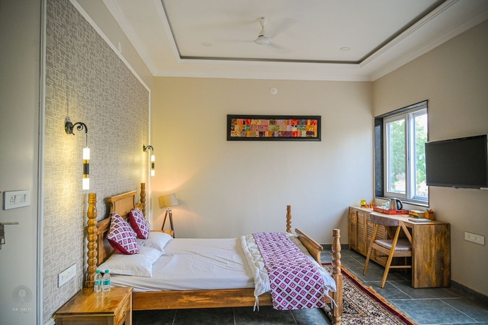 Imagen de la habitación del Hotel The Arham Resort. Foto 9