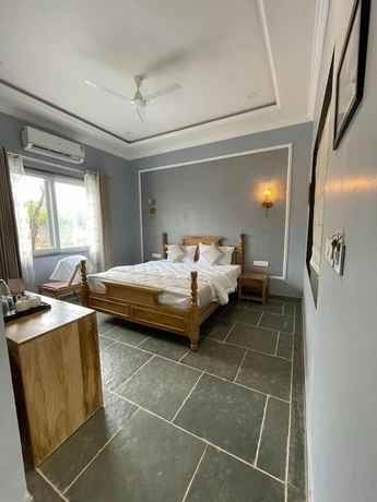 Imagen de la habitación del Hotel The Arham Resort. Foto 10