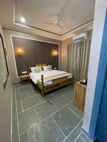 Imagen de la habitación del Hotel The Arham Resort. Foto 12