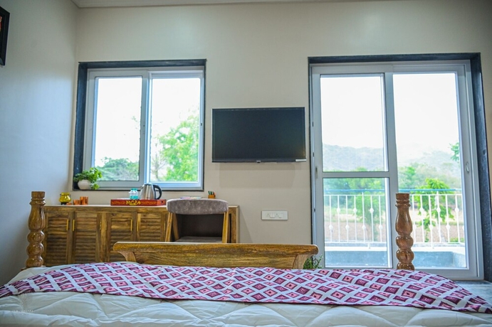 Imagen de la habitación del Hotel The Arham Resort. Foto 15